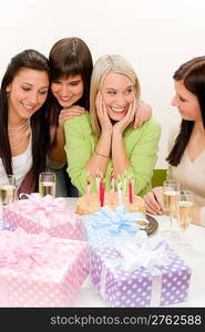 Birthday party - group of woman celebrate with cake and champagne