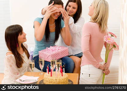 Birthday party - woman getting present and flower, surprise