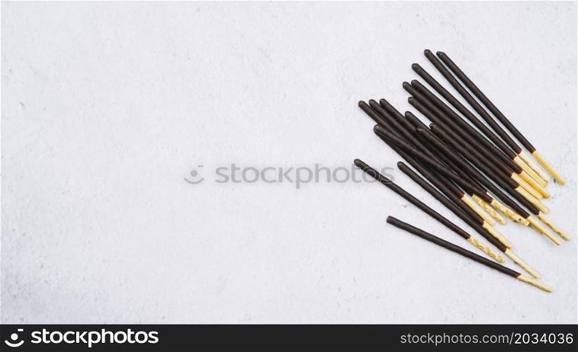 biscuit sticks chocolate white backdrop