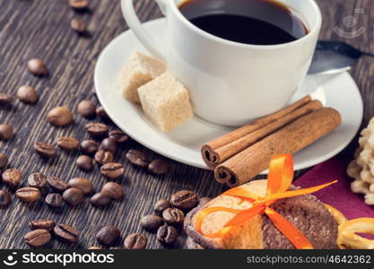 Biscuits and coffee on table. Assorted biscuits and sweets with a cup of coffee on table