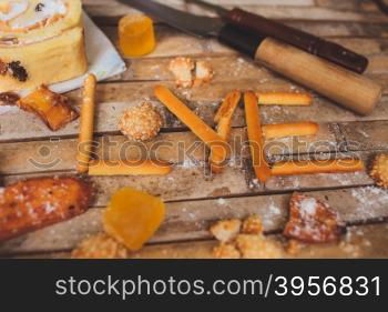 biscuits cake lying on a brown board rustic love shaped breakfast for Valentine&rsquo;s Day for lovers.