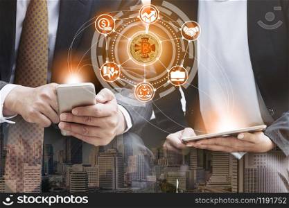Bitcoin and cryptocurrency investing concept - Businessman using mobile phone application to trade Bitcoin BTC with another trader in modern graphic interface. Blockchain and financial technology.. Bitcoin BTC and Cryptocurrency Trading Concept
