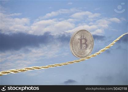 Bitcoin balancing on golden rope in the sky.. Bitcoin balancing on golden rope