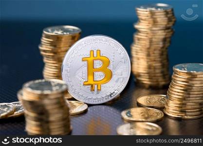 Bitcoin. Bitcoin coin bit golden bit sybmol logo with gold coins stacks.