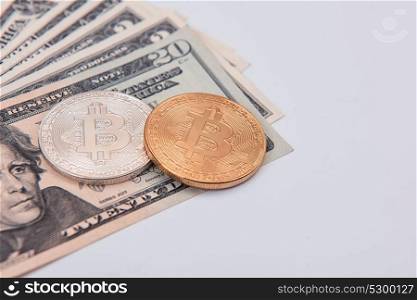 Bitcoin coin with dollars. Bitcoin coin with dollars on the laptop background