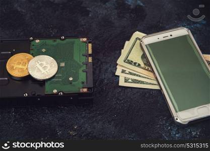 Bitcoin coin with HDD. Bitcoin coin on the HDD background