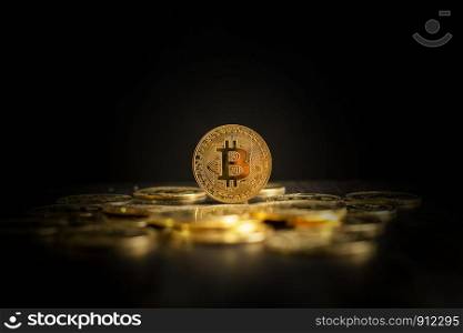 Bitcoin coins on black background