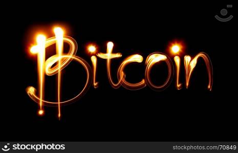 Bitcoin sign and word over black background. Light painting