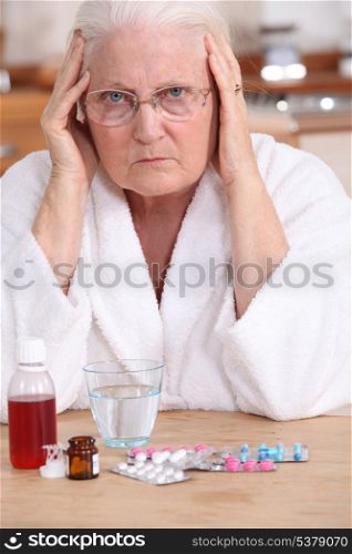 Bitter woman in front of her medication