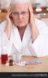 Bitter woman in front of her medication