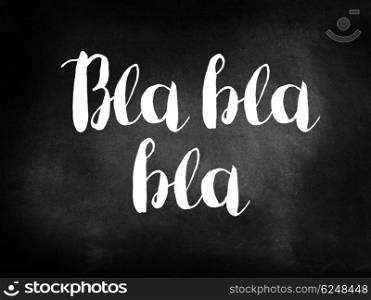 Bla bla bla written on a blackboard