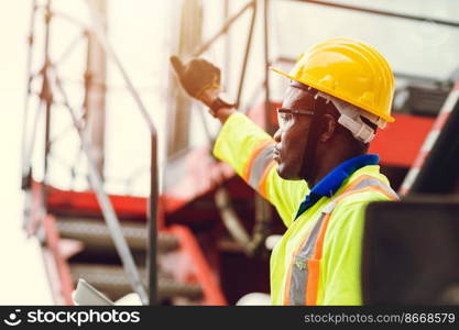 Black African port shipping staff director working in logistic control loading containers at ship cargo for import export goods foreman feel exhausted tired boring