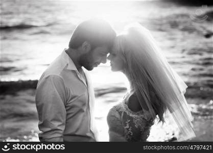 Black&amp;white portrait of attractive newlyweds