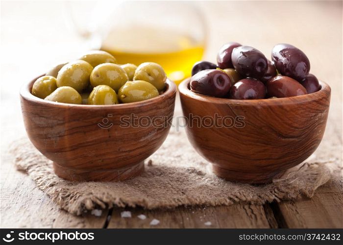 black and green marinated olives in bowl