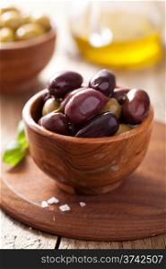 black and green marinated olives in bowl