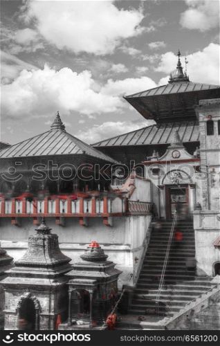 black and red and white photo. Votive temples and shrines in a row at Pashupatinath Temple, Kathmandu, Nepal.