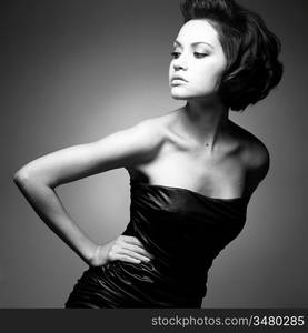 Black and white art photo. Elegant lady with stylish short hairstyle.