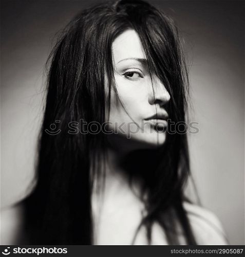 Black and white art portrait of a beautiful young lady
