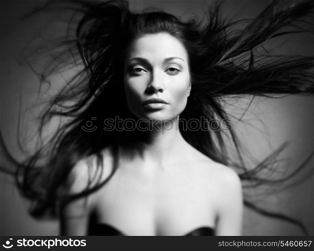 Black and white art portrait of a beautiful young lady
