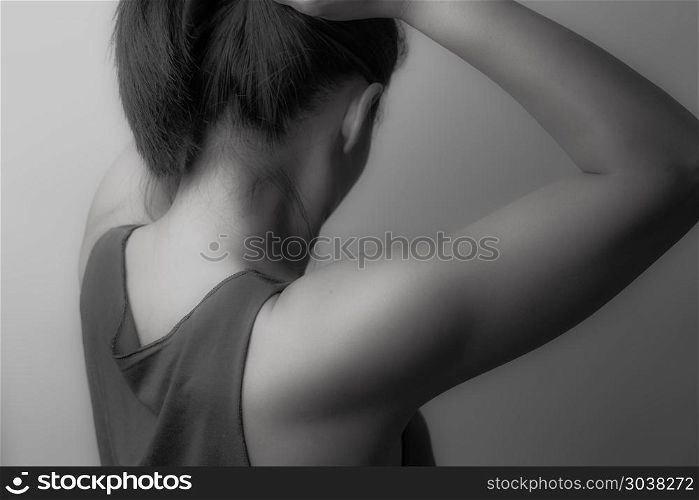 black and white color of rear view women tightening the hair, li. black and white color of rear view women tightening the hair, lifestyle concept - B&W filter