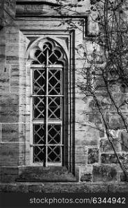 Black and white detail image of Regency period design window in medieval house