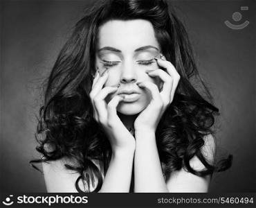 Black and white fashion photo of young beautiful woman