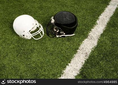 Black and white football helmets