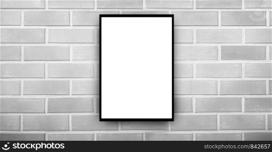 black and White frames on brick wall
