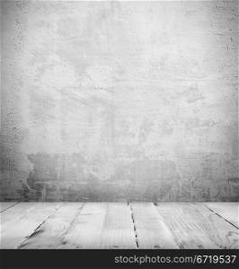 Black and white grunge interior of stone wall and wooden floor