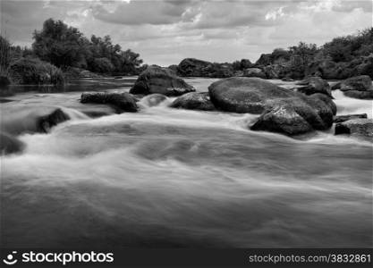 Black and white image of river cascades