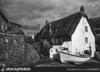 Black and white image of traditional English old fishing village