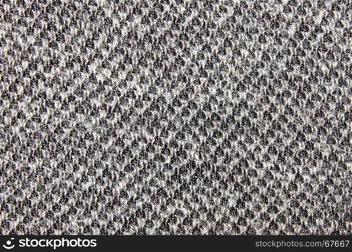 Black and white knitting fabric texture background or knitted pattern background. Knitting or knitted background.
