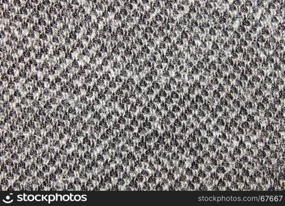 Black and white knitting fabric texture background or knitted pattern background. Knitting or knitted background.