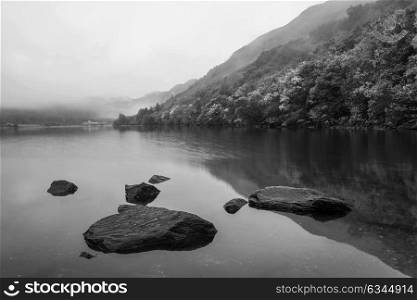 Black and white Landscape of Llyn Crafnant during foggy morning in Snowdonia National Park