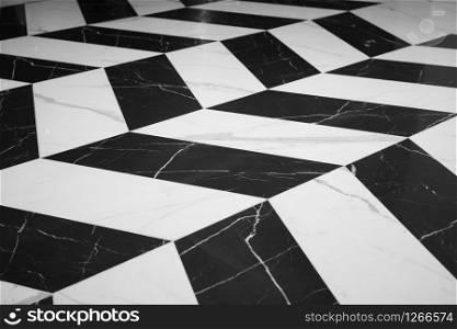 Black and white marble texture Were arranged alternately to create patterns For interior design of buildings and houses Texture concept, free space background and copy spaces.