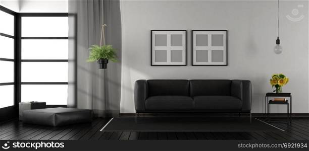Black and white minimalist living room. Black and white minimalist living room with leather sofa and footstool - 3d rendering