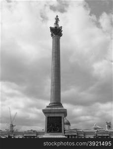 Black and white Nelson Column in London. Nelson Column monument in Trafalgar Square in London, UK in black and white