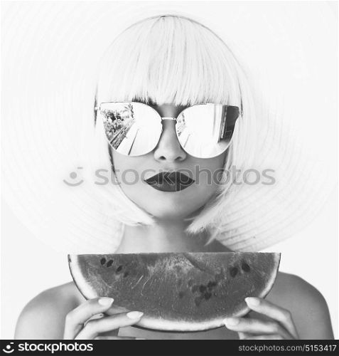 Black and white outdoor fashion photo of young beautiful lady in hat and sunglasses with watermelon. Summer Beach travel. Summer vibes