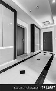 Black and white photo of rental apartment business interior