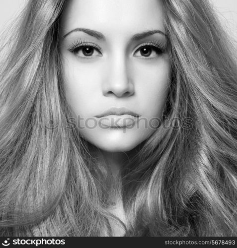 Black and white photo of young beautiful woman