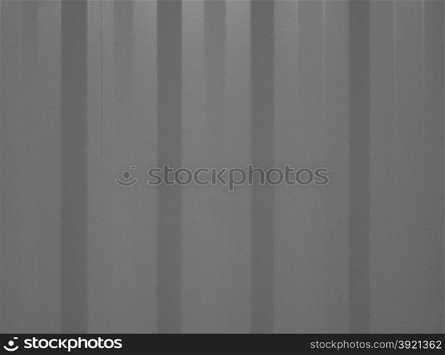 Black and white Pink corrugated steel background. Pink corrugated steel texture useful as a background in black and white