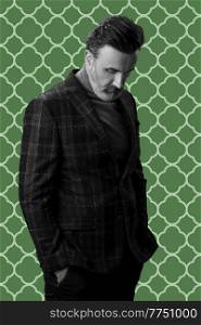 Black and white portrait of a stylish elegant senior businessman with a beard and casual business clothes against retro colorful pattern design background gesturing with hands. High quality photo. Black and white portrait of a stylish elegant senior businessman with a beard and casual business clothes against retro colorful pattern design background gesturing with hands