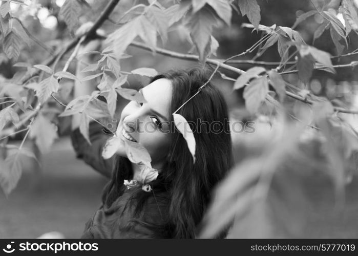 Black and White portrait of a woman in park