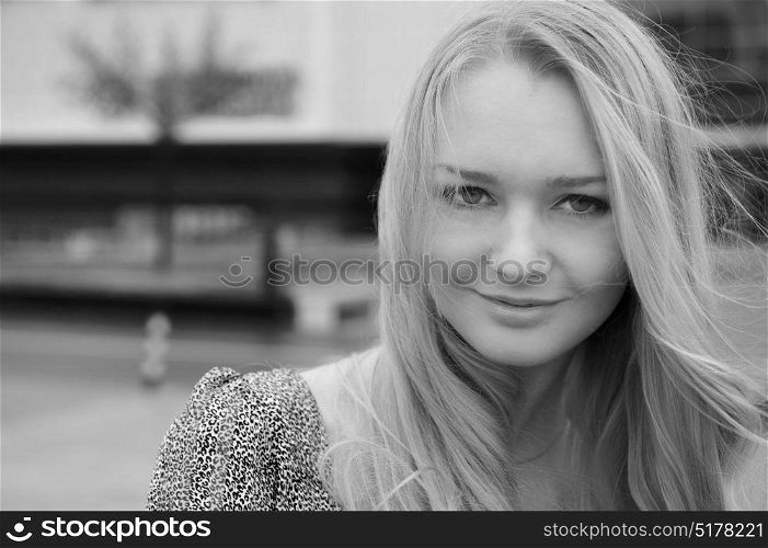 Black and white portrait of a young blonde model