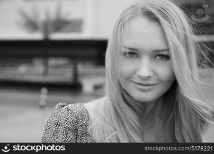 Black and white portrait of a young blonde model