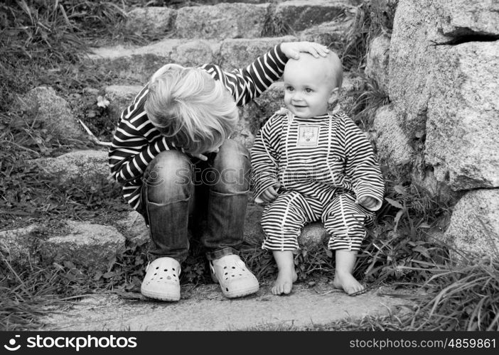 Black and white portrait of two boys in the countryside