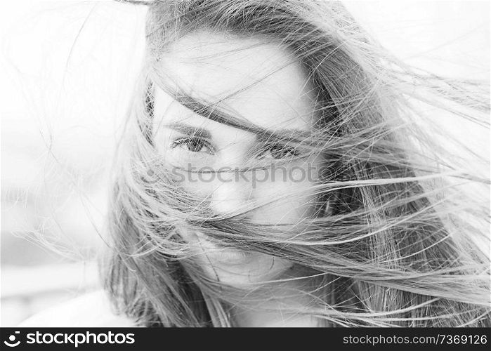 Black and white portrait poster girl beautiful flying in the wind hair face hairstyle style