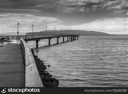 Black and white shot of the pier in Des Moines, Washington.
