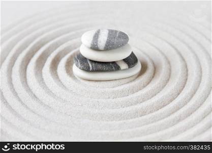 Black and white stones in the sand. Zen japanese garden background scene. Zen japanese garden background