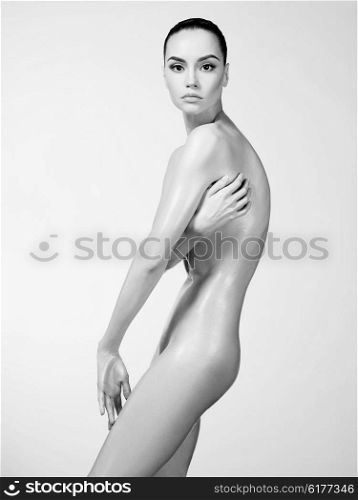 black and white studio photo of elegant naked lady